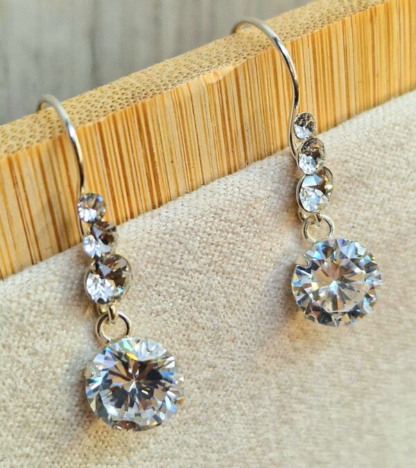 Silver Drop Dangle Beautiful Shiny CZ Crystal Earrings - This exquisite earring captivates with its timeless elegance.